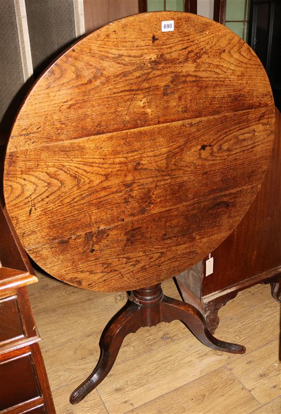 A George II oak tripod table, W.83cm